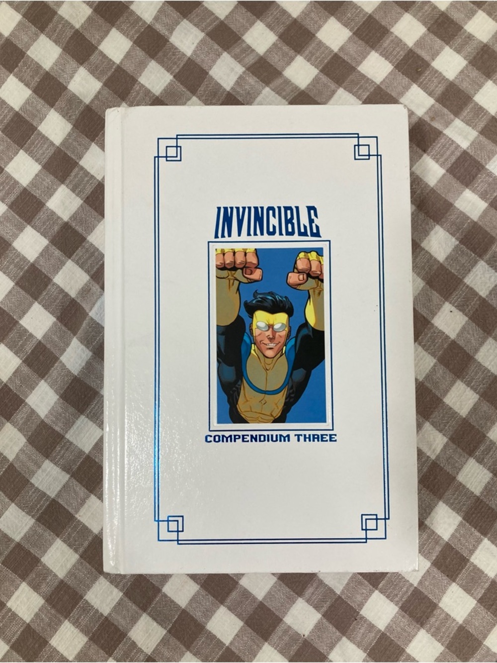 Invincible Compendium Three Hardcover - White with Blue Accents